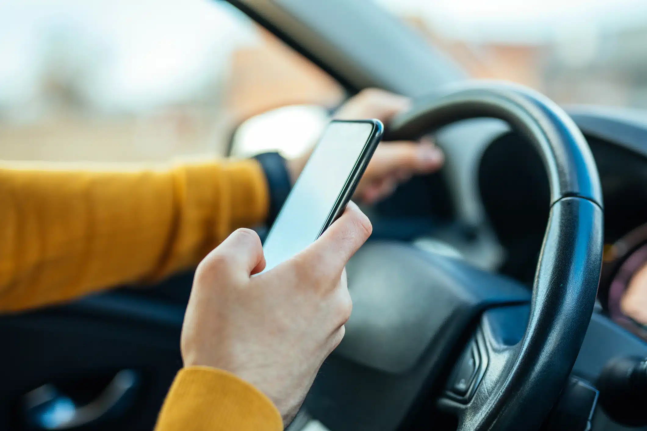 Someone texting while driving.