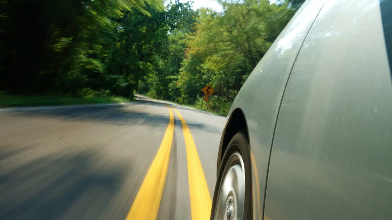 Car Driving On Rural Road Stock Photo