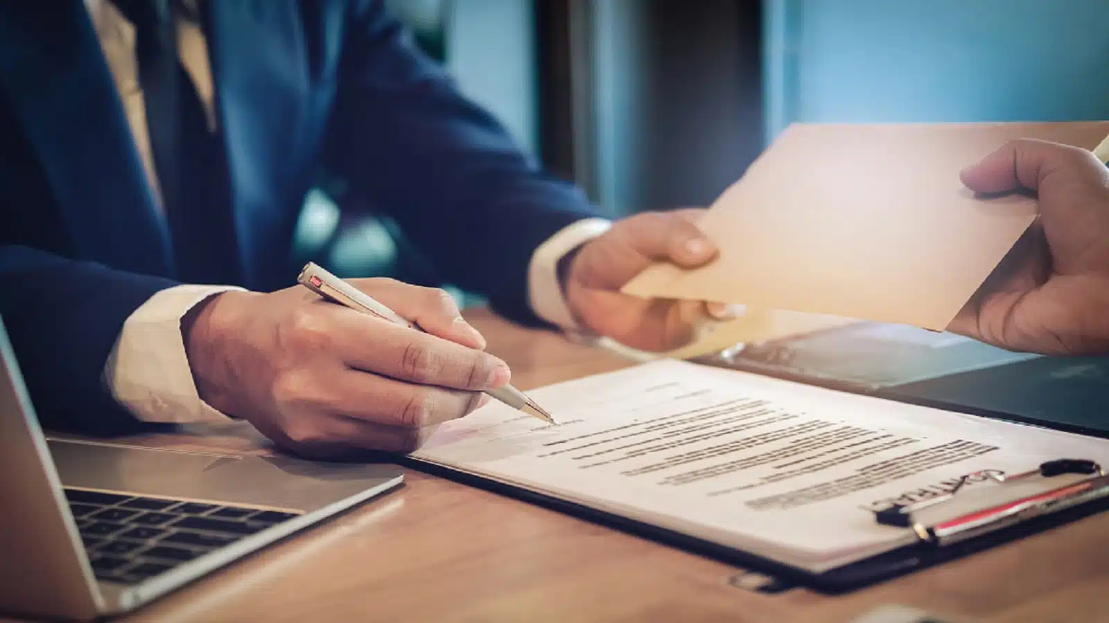 Lawyer Explaining Legal Documents To Client Stock Photo